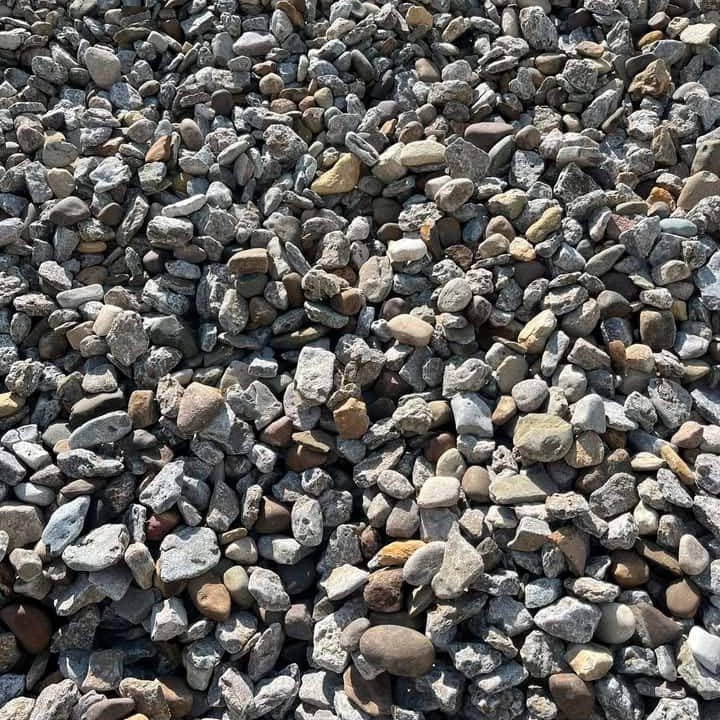 Assorted small gravel stones for garden and landscape projects.